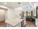 Modern kitchen with island, stainless steel appliances, and granite countertops at 19834 W Rancho Dr, Litchfield Park, AZ 85340