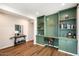 Built-in shelves and workspace, ideal home office at 19834 W Rancho Dr, Litchfield Park, AZ 85340