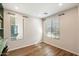 Bright home office with large windows and wood flooring at 19834 W Rancho Dr, Litchfield Park, AZ 85340