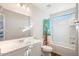 Bathroom with bathtub, toilet, and vanity at 19834 W Rancho Dr, Litchfield Park, AZ 85340