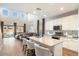 Spacious kitchen with a large island and stainless steel appliances at 19834 W Rancho Dr, Litchfield Park, AZ 85340