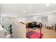 Upstairs loft area with a couch, and gymnastics equipment at 19834 W Rancho Dr, Litchfield Park, AZ 85340
