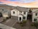 Two-story house with gray garage door and mountain views at 19834 W Rancho Dr, Litchfield Park, AZ 85340