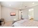Bright bedroom with plush carpet and en-suite bathroom access at 19834 W Rancho Dr, Litchfield Park, AZ 85340