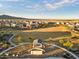 Aerial view of a park in a residential community with playground equipment at 19834 W Rancho Dr, Litchfield Park, AZ 85340