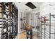 Modern wine cellar with ample storage for wine bottles at 6432 E El Sendero Rd, Carefree, AZ 85377