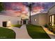 Modern entryway with artificial turf and a walkway at 6432 E El Sendero Rd, Carefree, AZ 85377