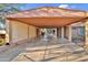 Covered carport provides parking and storage space at 3802 W Sherman St, Phoenix, AZ 85009