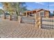 House with wrought iron fence and brick driveway at 3802 W Sherman St, Phoenix, AZ 85009