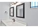 Bathroom with double vanity and framed mirrors at 3802 W Sherman St, Phoenix, AZ 85009