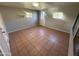 Bright bonus room with tile flooring and backyard access at 1458 E Black Diamond Dr, Gilbert, AZ 85296