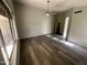 Spacious bedroom with large window and laminate flooring at 1458 E Black Diamond Dr, Gilbert, AZ 85296