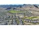 Expansive view of a residential area nestled in mountains at 20594 W Pasadena Ave, Buckeye, AZ 85396