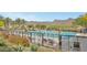 Community lap pool with mountain backdrop at 20594 W Pasadena Ave, Buckeye, AZ 85396