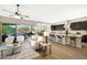 Open and airy living space with kitchen access at 20594 W Pasadena Ave, Buckeye, AZ 85396
