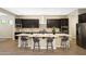 Modern kitchen with large island and ample cabinetry at 20594 W Pasadena Ave, Buckeye, AZ 85396
