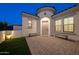 Welcoming front entry with landscaping and seating at 20594 W Pasadena Ave, Buckeye, AZ 85396