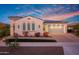Single-story home with three windows and attached garage at 20594 W Pasadena Ave, Buckeye, AZ 85396
