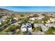 Single-story home with solar panels in a residential neighborhood at 20594 W Pasadena Ave, Buckeye, AZ 85396