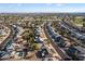 Aerial view showcasing neighborhood homes and streets at 10452 W Meade Dr, Sun City, AZ 85351