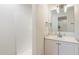 Clean bathroom with shower, vanity, and mirror at 10452 W Meade Dr, Sun City, AZ 85351