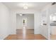 Open concept living and dining area with light floors and neutral walls at 10452 W Meade Dr, Sun City, AZ 85351