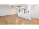 Bright and airy living room with light wood floors and ceiling fan at 10452 W Meade Dr, Sun City, AZ 85351