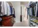 Large walk-in closet with double hanging rods and drawers at 4526 E Vista Bonita Dr, Phoenix, AZ 85050