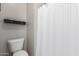 Clean bathroom with toilet and shower curtain at 4526 E Vista Bonita Dr, Phoenix, AZ 85050