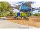 Community playground with modern play structures and shaded areas at 4526 E Vista Bonita Dr, Phoenix, AZ 85050
