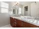 Double vanity bathroom with granite countertops at 4526 E Vista Bonita Dr, Phoenix, AZ 85050