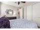 Comfortable bedroom with a dresser and large mirror at 4526 E Vista Bonita Dr, Phoenix, AZ 85050