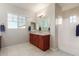 Main bathroom with double vanity and shower at 4526 E Vista Bonita Dr, Phoenix, AZ 85050