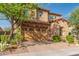 Two-story house with stone and stucco exterior, and a landscaped yard at 4526 E Vista Bonita Dr, Phoenix, AZ 85050