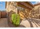 Three-car garage with stone exterior and landscaping at 4526 E Vista Bonita Dr, Phoenix, AZ 85050