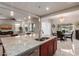 Modern kitchen island with granite countertop and double sink at 4526 E Vista Bonita Dr, Phoenix, AZ 85050