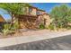 Beautiful two-story house with stone facade and landscaped yard at 4526 E Vista Bonita Dr, Phoenix, AZ 85050