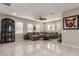 Spacious Gathering room with L-shaped sectional sofa and large artwork at 4526 E Vista Bonita Dr, Phoenix, AZ 85050