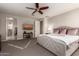 Main bedroom with king-size bed and ensuite bathroom access at 4526 E Vista Bonita Dr, Phoenix, AZ 85050