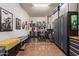 Garage with epoxy floor, storage cabinets, and a home gym setup at 4526 E Vista Bonita Dr, Phoenix, AZ 85050