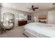 Main bedroom with king-size bed and walk-in closet access at 4526 E Vista Bonita Dr, Phoenix, AZ 85050