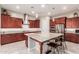 Gourmet kitchen boasts granite countertops and rich wood cabinetry at 4526 E Vista Bonita Dr, Phoenix, AZ 85050