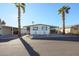 Front view of a manufactured home with carport at 6960 W Peoria Ave # 172, Peoria, AZ 85345