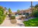 Community pool and grilling area with ample space for relaxation at 8653 E Royal Palm Rd # 2003, Scottsdale, AZ 85258