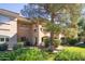 Two-story building exterior with balconies and lush landscaping at 8653 E Royal Palm Rd # 2003, Scottsdale, AZ 85258