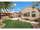 Landscaped backyard featuring a hot tub and spacious patio at 10802 E Secret Canyon Rd, Gold Canyon, AZ 85118