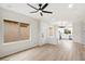 Open living room with light flooring and ceiling fan at 10802 E Secret Canyon Rd, Gold Canyon, AZ 85118