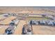Aerial view of a community of new homes and several empty lots at 13637 W Hackamore Dr, Peoria, AZ 85383