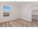 Well-lit bedroom featuring carpet and walk-in closet at 13637 W Hackamore Dr, Peoria, AZ 85383