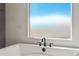 Freestanding bathtub with modern black faucet at 13637 W Hackamore Dr, Peoria, AZ 85383